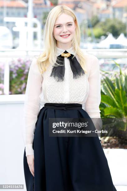 Elle Fanning wearing Chopard jewelry attends the Jury photocall during the 72nd Cannes Film Festival at the Palais des Festivals on May 14, 2019 in...