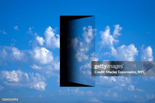 view of the sky with a doorway in it. - surrealismo imagens e fotografias de stock