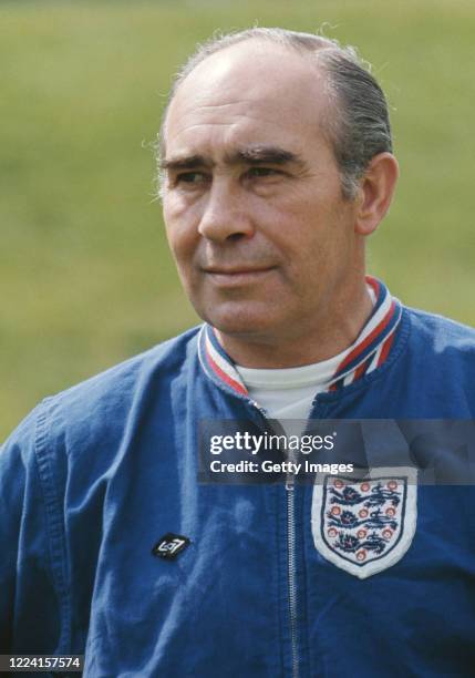 England manager Alf Ramsey in his Umbro tracksuit top, looks on during a training session circa 1970 in London, United Kingdom.