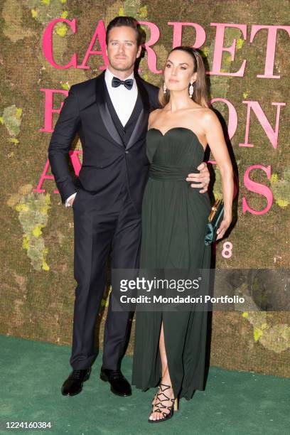 Green carpet Fashion Awards 2018. In the picture:Armie Hammer, Elizabeth Chambers. An enchanted forest has invaded this year Piazza della Scala. A...