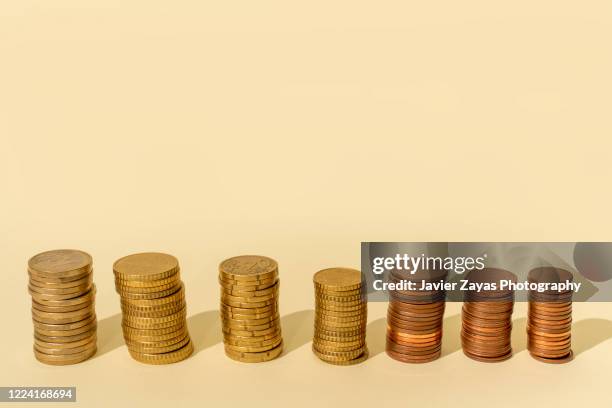 Coin Stack Tower Penny Tower Photos and Premium High Res Pictures - Getty Images