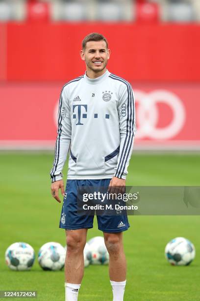 Lucas Hernandez of FC Bayern Muenchen smiles during a training session at FC Bayern Campus on May 11, 2020 in Munich, Germany. FC Bayern Muenchen...