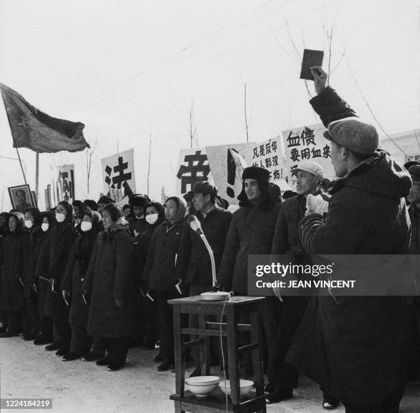 Chinese people demonstrate during the "great proletarian Cultural Revolution" in front of the French embassy, on January 1967 in Beijing. Protesters...