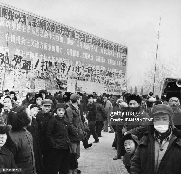 Chinese people gather in a street of Beijing in the late 60s during the "great proletarian cultural revolution". - Since the cultural revolution was...