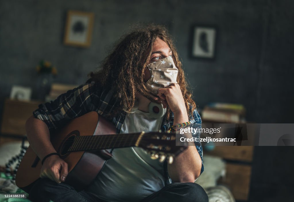 Couple having music time together at home