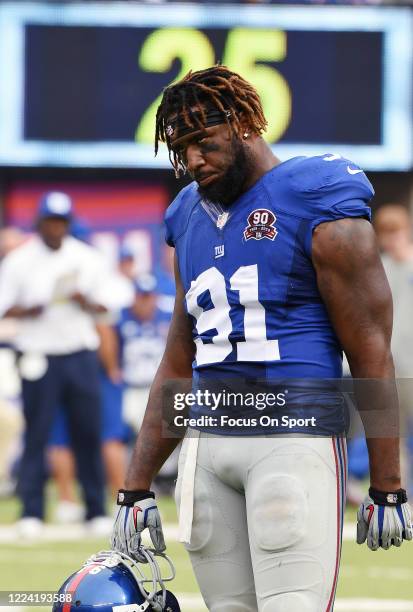 Robert Ayers of the New York Giants looks on against the Houston Texans during an NFL football game September 21, 2014 at MetLife Stadium in East...