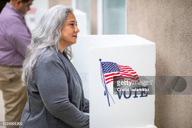 senior mexican woman voting - presidential election 2020 stock pictures, royalty-free photos & images
