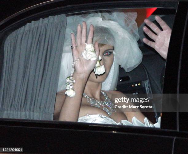 Donald Trump's new bride Slovenian model Melanai Knauss waves as she leaves the Bethesda-by-the-Sea Episcopal Church after her wedding to Donald in...