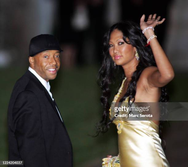 Russel Simmons and his wife arrive at Bethesda-by-the-Sea Episcopal Church for the wedding of Donald Trump to Slovenian model Melanai Knauss in Palm...