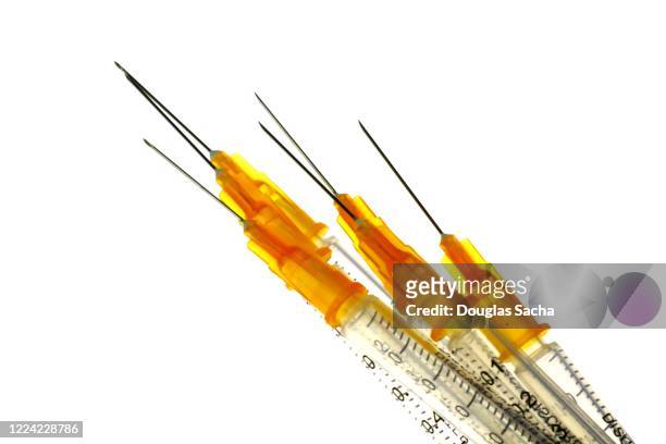 assortment of clean syringes for illegal drug use on a white background - crack cocaine fotografías e imágenes de stock