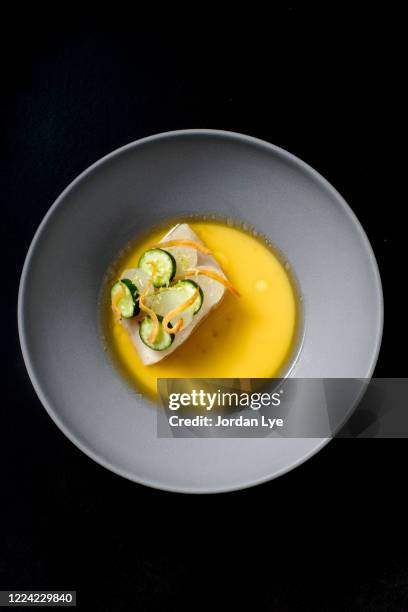 seabass with pouring shaoxing broth - course meal stock pictures, royalty-free photos & images