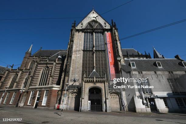 The New Church stands with a message by the Dutch King Willem-Alexander, reading "Alertness, Solidarity and Warmth", in his speech to the people of...