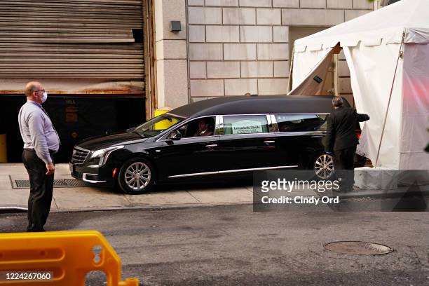 Hearse containing the body of Glen Ridge New Jersey police officer Charles Roberts leaves the makeshift morgue at Lenox Hill Hospital on May 11, 2020...