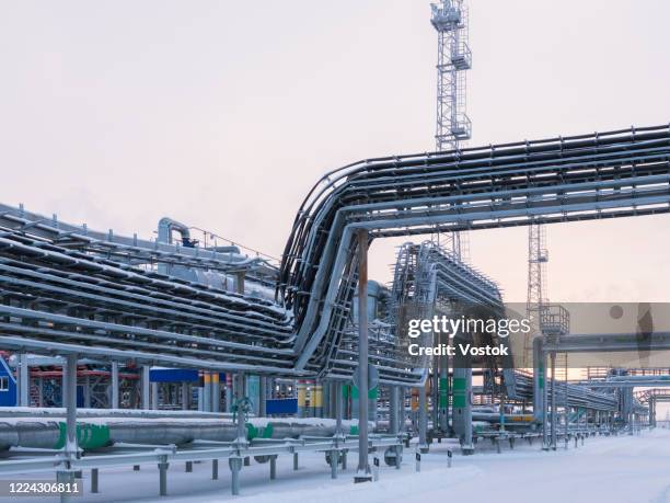 territory of a gas station in the north of russia - russia winter stock pictures, royalty-free photos & images