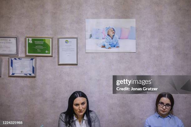 The former surrogate mother, Nini Baratashvili, is waiting at the office of the surrogate mother clinic Happy Family to possibly plan for a new...