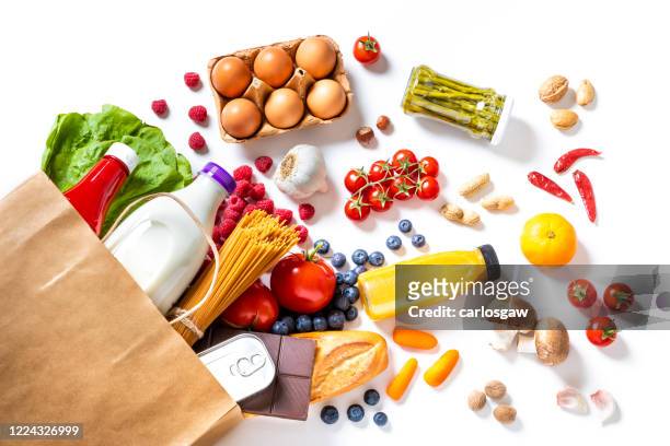 peperzak vol boodschappen - grocery food stockfoto's en -beelden