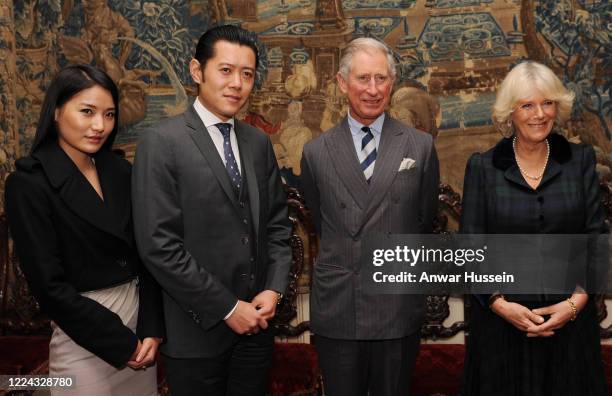 King Jigme Khesar Namgyel Wangchuk and Queen Jetsun Pema Wangchuck of Bhutan meet Prince Charles Prince of Wales and Camilla Duchess of Cornwall at...