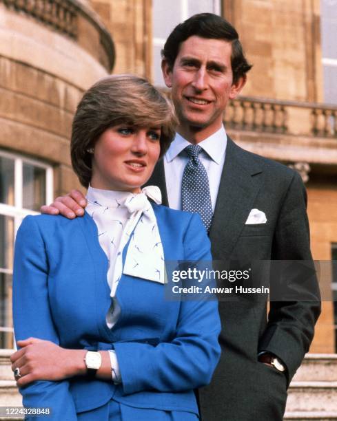 Lady Diana Spencer and Prince Charles, Prince of Wales pose for photographs following the announcement of their engagement in the grounds of...