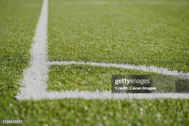 white line football corner on green field - money floor stock pictures, royalty-free photos & images