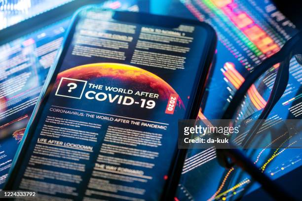 the world after covid-19 article - news event stock pictures, royalty-free photos & images