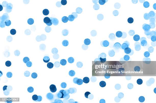 bright blue confetti isolated on white background. - blue confetti stockfoto's en -beelden