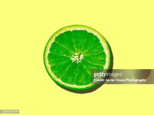 lime slice - lime juice stock pictures, royalty-free photos & images