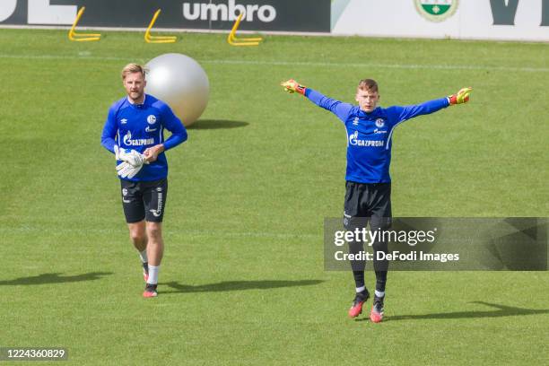 Goalkeeper Ralf Faehrmann of FC Schalke 04 and goalkeeper Markus Schubert of FC Schalke 04 looks on during the FC Schalke 04 Training Session on May...