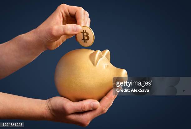investing savings in bitcoin is gold - bitcoin stock pictures, royalty-free photos & images