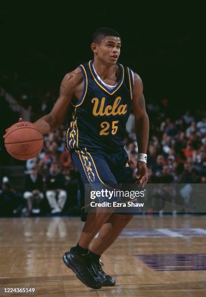 Earl Watson, Guard for the University of California, Los Angeles UCLA Bruins dribbles the ball during the NCAA Pac-10 Conference college basketball...