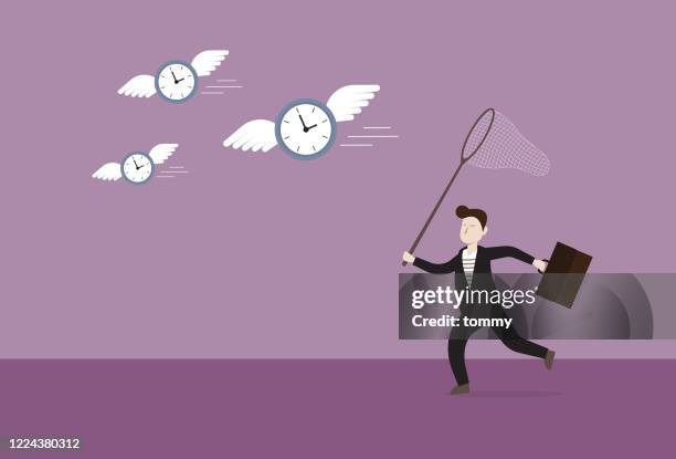 businessman uses a butterfly net to catch a clock - butterfly net stock illustrations