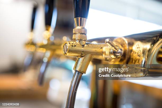 beer tap - close-up. - bar czech stock-fotos und bilder