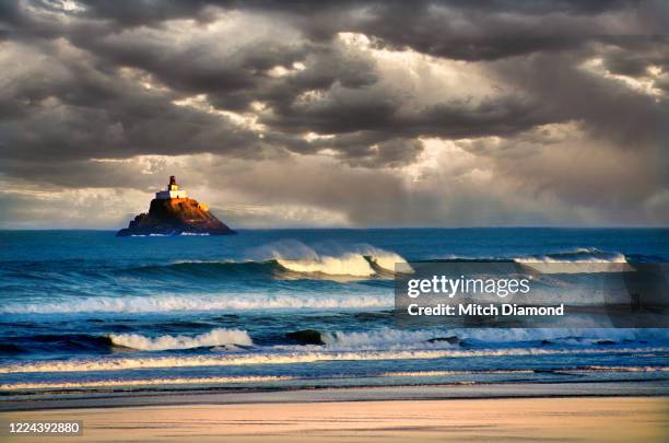 stormy tillamook rock lighthouse - tillamook lighthouse stock pictures, royalty-free photos & images