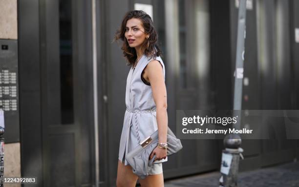 Masha Sedgwick wearing Gestuz bag and Cos dress on May 06, 2020 in Berlin, Germany.