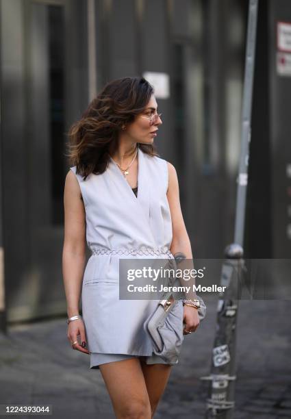 Masha Sedgwick wearing Gestuz bag and Cos dress on May 06, 2020 in Berlin, Germany.