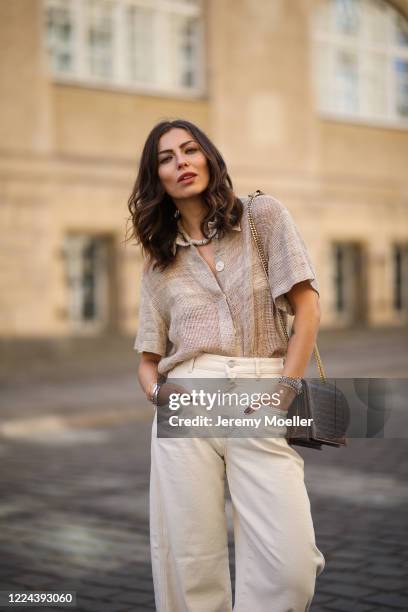 Masha Sedgwick wearing Nobi Talai blouse, Agneel bag and Closed jeans on May 06, 2020 in Berlin, Germany.