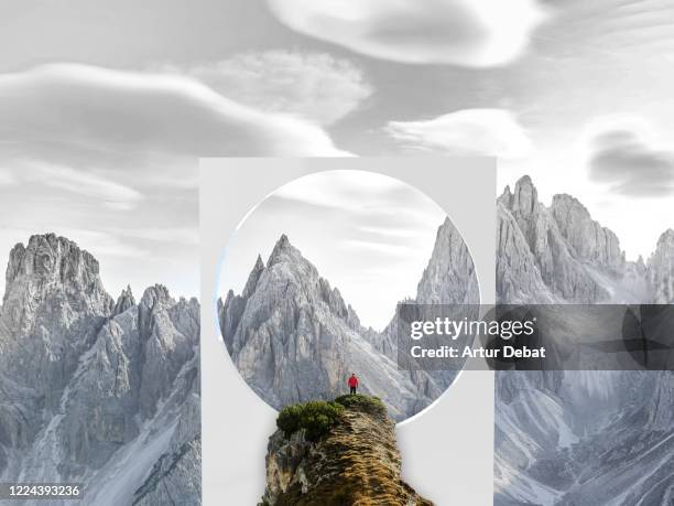 creative picture of huge geometric shape with circle in middle of nature with dolomites mountains and hiker. - new paradigma stock pictures, royalty-free photos & images