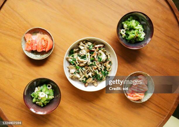 healthy vegetable dishes on the table - sunomono stock pictures, royalty-free photos & images