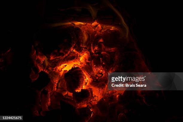 full frame of wood embers - burning embers stock pictures, royalty-free photos & images