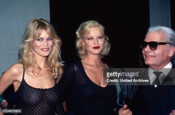 Models Claudia Schiffer and Eva Herzigova with couturier Karl Lagerfeld, Germany, 1992.