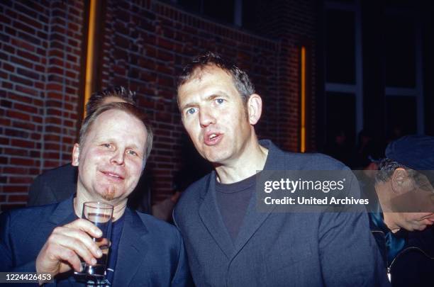 Dutch photographer Anton Corbijn with singer Herbert Groenemeyer at the opening ceremony of an exhibition with his works at NRW Forum in Duesseldorf,...