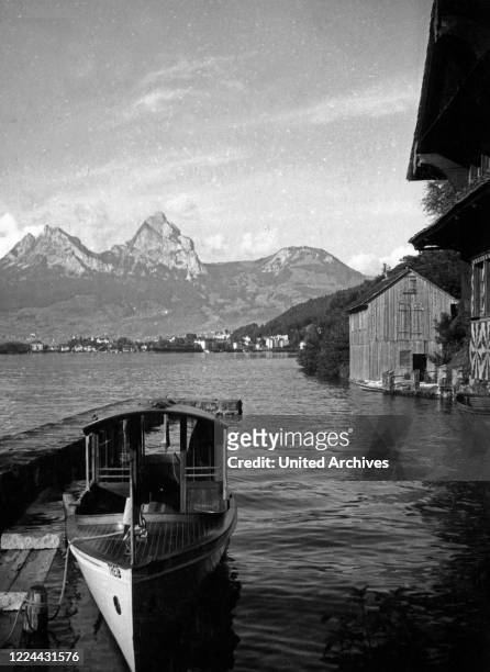Quay for pleasure boats at Treib's inn at Seelisberg in Uri canton, Switzerland 1930s.