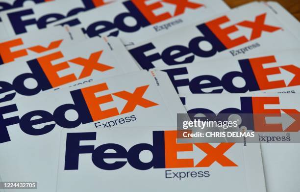 This illustration photo taken on July 2, 2020 shows a Fedex envelope with the company logo in Los Angeles. - US delivery giant FedEx Corp. Is seeking...