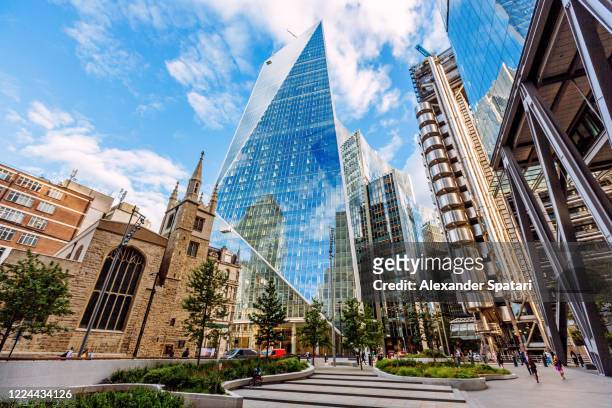 old church surrounded by modern skyscrapers in the city of london financial district, england, uk - central london stock pictures, royalty-free photos & images