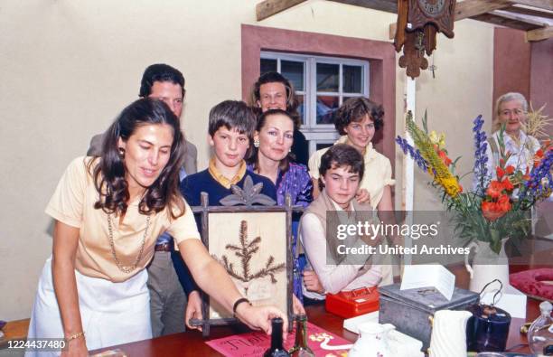 Diane Duchess of Wurttemberg with the family at a charity event for her foundation at Altshausen, Germany, 1984.