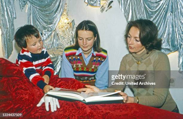 Diane Duchess of Wurttemberg with the children Mathilde and son having some private time at Altshausen castle, Germany, 1983.