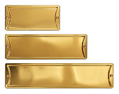 Empty gold or brass metal plates set, isolated on a white background. Clipping path included.