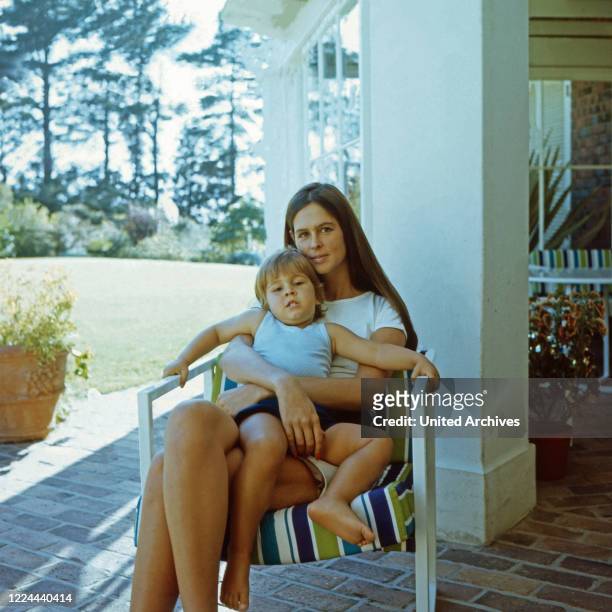 Barbara Barnard, nee Zoellner, with son Frederick at the terrace of villa "Waiohai" in Cape Town, South Africa 1974.