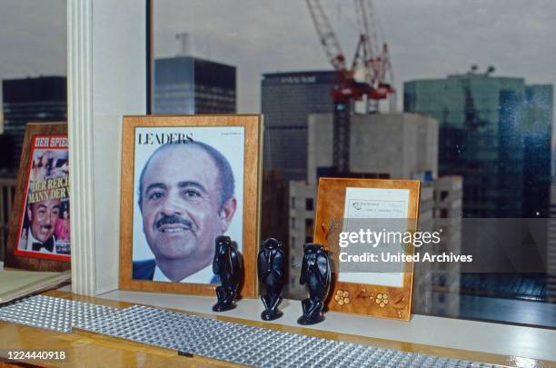 Souvenirs collected by Adnan Khashoggi at his desk in his office at Olympic Tower in New York, USA 1986.