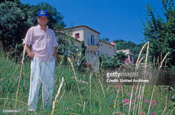 German ice skater and TV host Hans Juergen Baeumler at the garden of his home at Villeneuve Loubet, France 1996.