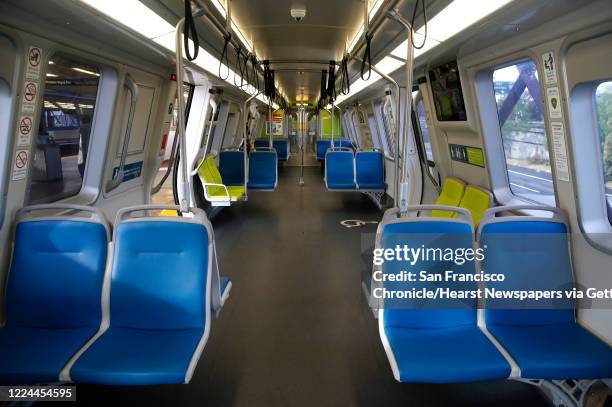 Cars of a train heading for Millbrae is devoid of commuters at the MacArthur BART station in Oakland, Calif. On Tuesday, May 12, 2020. BART joined...